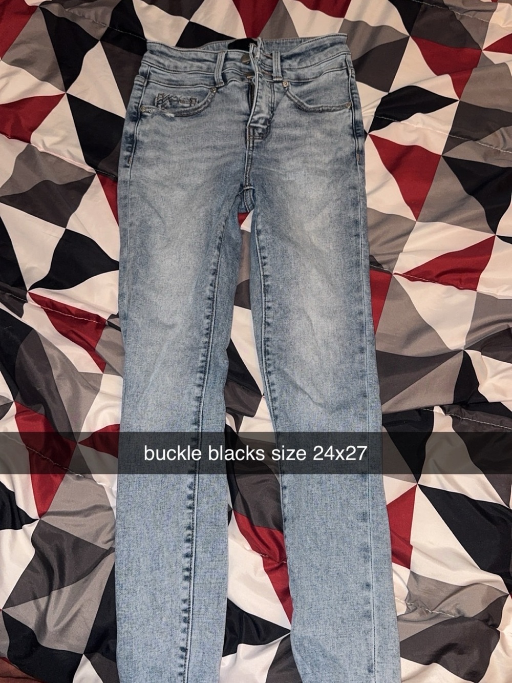Buckle Skinny Jeans in Light Blue Wash